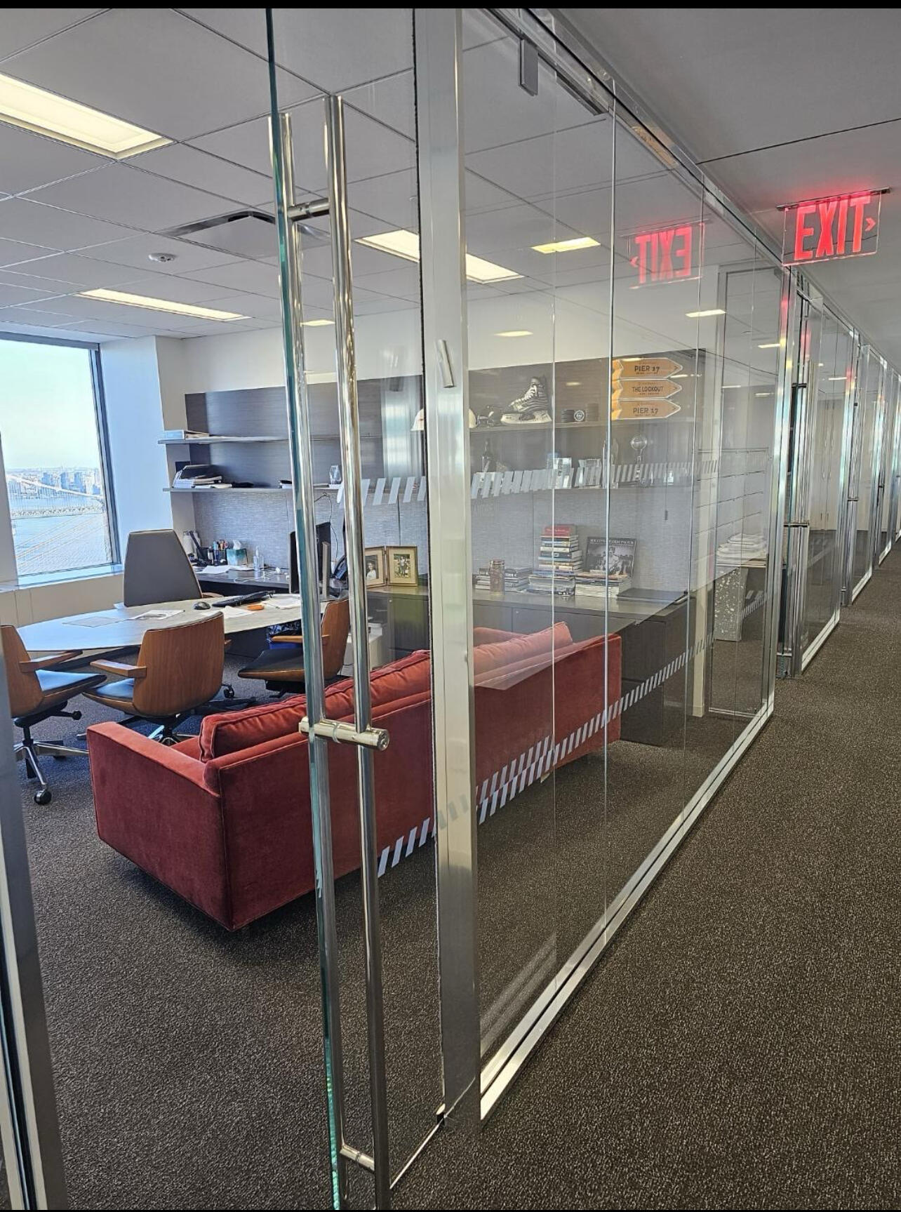 Executive office suite seen through streak-free glass partitions